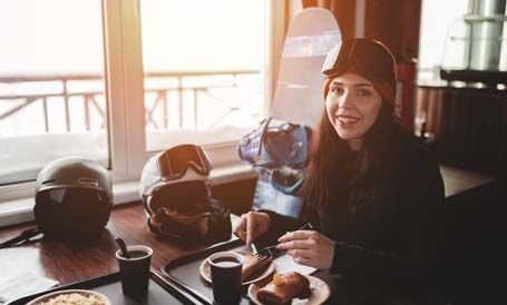 skier having breakfast